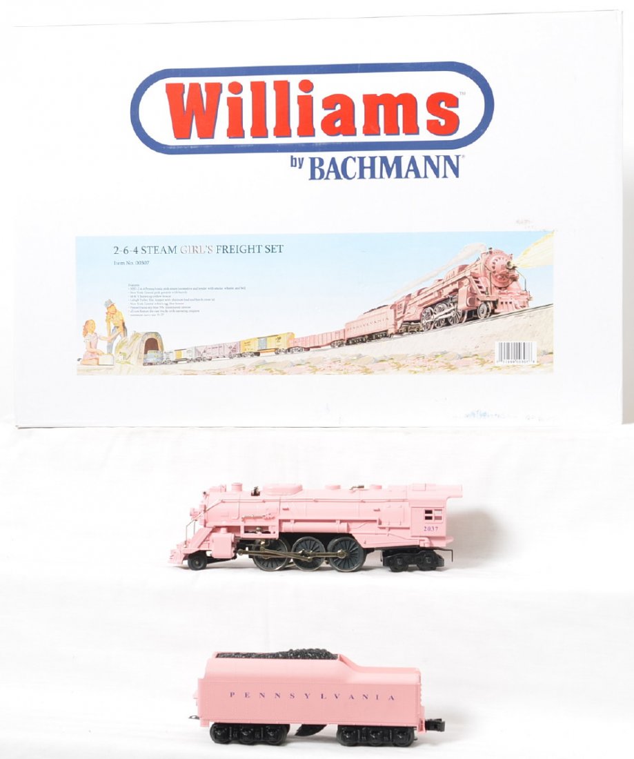 Williams by Bachmann GirlÃ•s Train set: Williams by Bachmann modern O gauge 00307 GirlÃ•s Train reissue in OB. Set is C8 with run time. Loco features smoke, whistle, and bell. OB has some light wear.