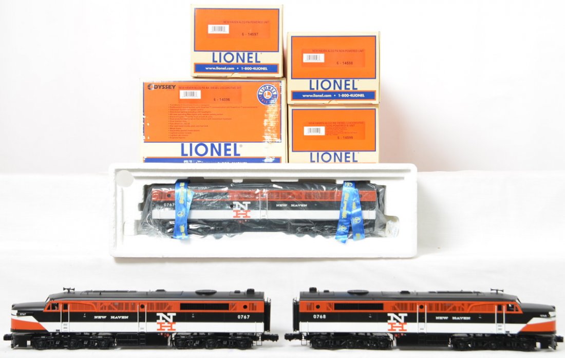 Lionel New Haven Alco PA A-B-A set with TMCC: Lionel modern O gauge 14596 New Haven Alco PA A-B-A diesel locomotive set in OBs. Loco features TMCC, Railsounds, Electrocouplers, fan driven smoke, and much more. Locos are C8 with run time. Also inc