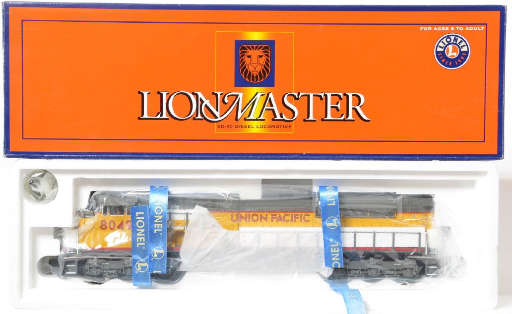 Lionel Lionmaster Union Pacific SD-90 28201: Lionel modern O gauge Lionmaster 28201 Union Pacific SD90 diesel locomotive in OB. Loco features TMCC, Railsounds, fan driven smoke, Electrocouplers, and much more. Loco is factory wrapped in the cart