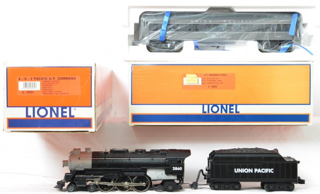 Lionel Union Pacific 4-6-2 and passenger cars: Lionel modern O gauge Union Pacific 4-6-2 steam locomotive in OB. Catalog number 28034. Loco features TMCC, Railsounds, Electrocouplers and more. Loco is C8 with moderate run time. Locomotive original