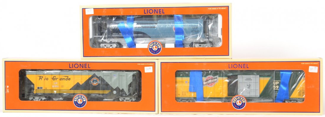 3 Lionel Union Pacific heritage freight cars 27434: Lionel modern O gauge Union Pacific heritage freight cars in OBs. Three cars include 27434 Rio Grande hopper, 27421 Missouri Pacific cylindrical hopper, and 27396 Chicago and Northwestern mechanical r