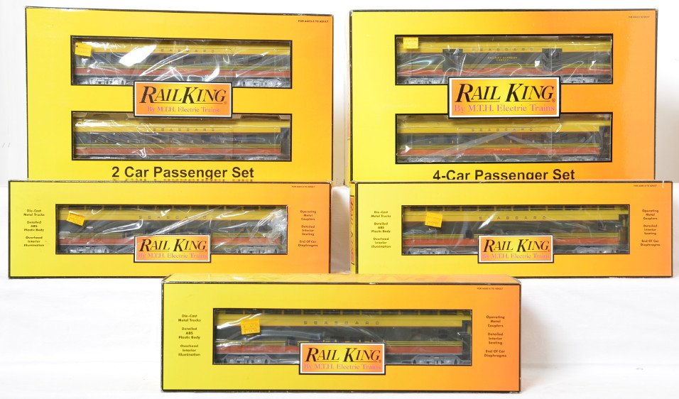 Railking Seaboard 9 car streamlined passenger set: MTH Railking modern O gauge Seaboard nine car streamlined passenger set in OBs. Includes 30-6720 two car add on set, three 6721 vista domes and 30-67703 four car set. Cars are C8 with run time. OBs ha
