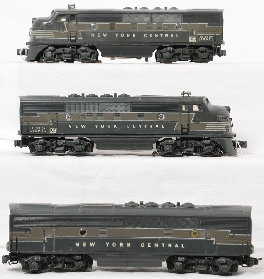 Lionel Postwar O gauge 2344 New York Central F3 ABA set: Lionel Postwar O gauge 2344 New York Central F3 ABA set, gray shells from 1952 but with large GM decals. No battery damage or screw cracks, C6+.