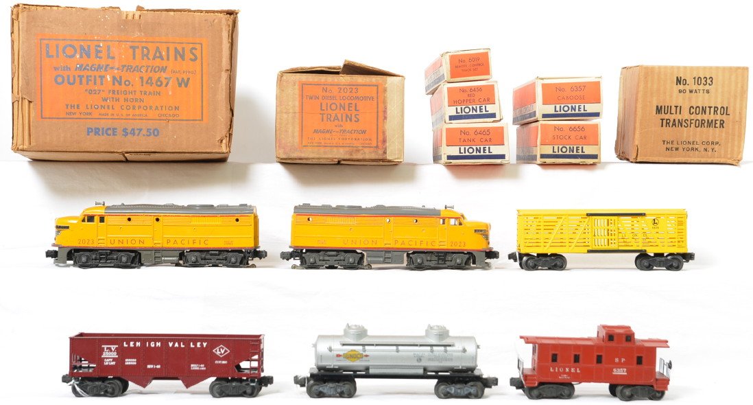 Lionel Postwar O gauge 1467W set in OB 2023 UP Alcos: Lionel Postwar O gauge 1467W set in original box with separate component boxes. The set consists of a 2023 Union Pacific Alco set with master carton, 6465 Sunoco tank car, 6456 maroon Lehigh Valley ho