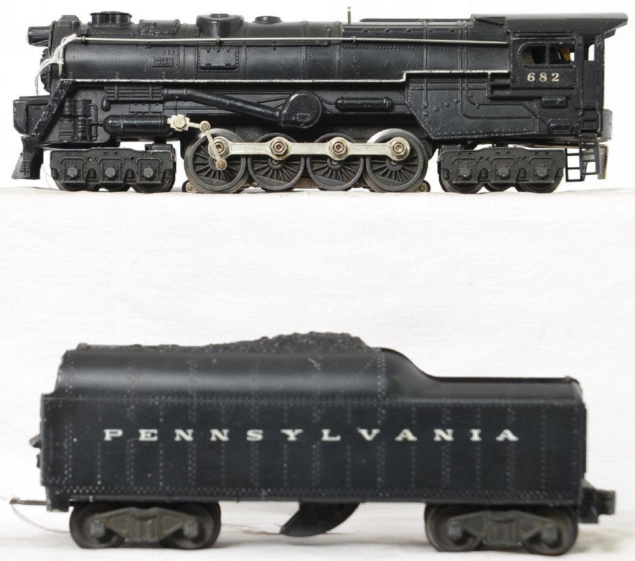 Lionel Postwar O gauge 682 steam turbine 2046W-50: Lionel Postwar O gauge 682 steam turbine 2046W-50 Pennsylvania tender, tender has some rust on the underside of the frame and on the draw bar but the set is still C6.