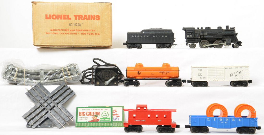 Lionel Postwar O gauge 19328 steam freight set in OB: Lionel Postwar O gauge 19328 steam freight set in original box to include 1061, 1060T, 6465, 6014, 6142 and 6167, transformer and track. Trains are C6 with a nice box and include track and a cut billb