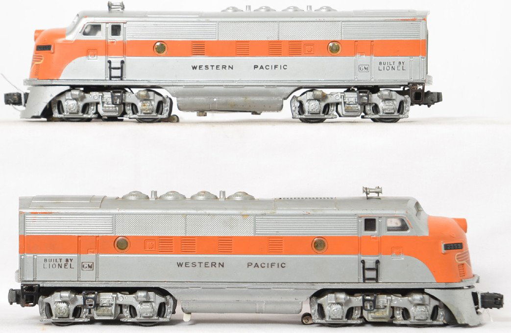 Lionel Postwar O gauge 2355 Western Pacific F3 AA set: Lionel Postwar O gauge 2355 Western Pacific F3 AA set, no battery damage outside but a small rust spot inside the battery compartment, C6.
