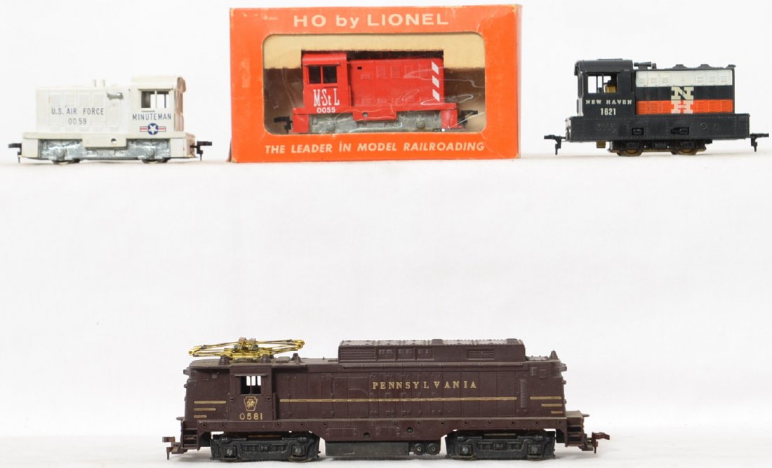 Lionel Postwar HO gauge 0055 0059 Husky switchers 0581: Lionel Postwar HO gauge 0055 Minneapolis and St. Louis and 0059 Minuteman Husky switchers, 0581 Pennsylvania rectifier and a Marx 1621 New Haven switcher. The 0055 is in a decent original box with ins