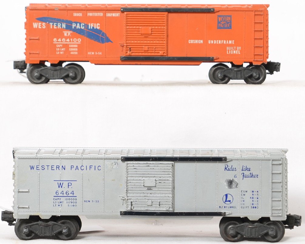 Lionel Postwar O gauge 6464 boxcars -1 with interior: Lionel Postwar O gauge 6464 boxcars including -1 silver Western Pacific with interior roof ribs C6, and a -100 Western Pacific blue feather with one catwalk end broken off, C5-6.