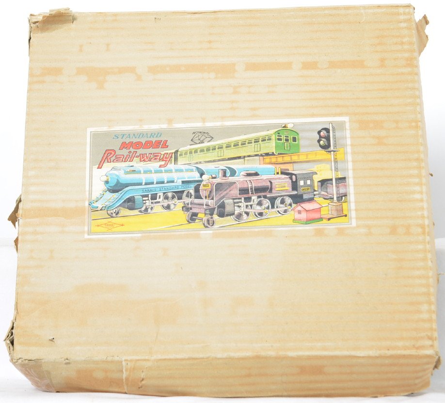 Sakai standard model railway in OB Japan tin: Sakai standard model railway in OB Japan tin train set in 3/16 scale with a Hudson & Pacific motif. includes a 2-6-2 steam locomotive, tender, two boxcars, gondola, tank car and caboose. original box 