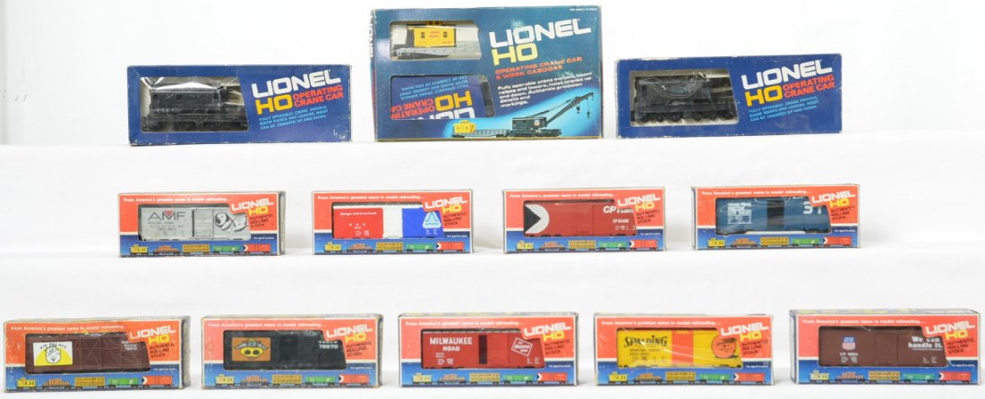 Lionel modern HO freight cars in OBs: Lionel modern HO freight cars in original boxes to include 8422 operating crane car & work caboose, 8572 pig car, 8570 cattle car, two 3401 operating crane cars and 8400, 8401, 8510, 8511, 8512, 8513 