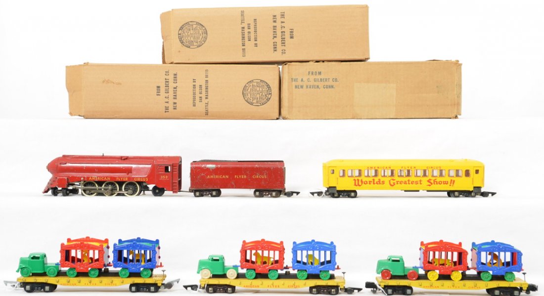 Three American Flyer postwar S gauge circus train: Three American Flyer postwar S gauge circus train to include 353 steam locomotive and tender, 649 passenger coach and three 643 flat cars, (two with original loads, one with a reproduction loads conta