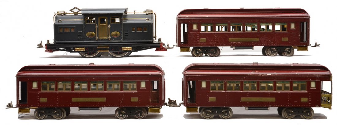 Lionel Std. Ga. Maroon Passenger Set no. 342: Lionel prewar standard gauge maroon passenger set no. 342, circa 1924 containing; 318 gray electric loco with black lettered brass plates, two 319 Pullmans and a 322 observation. The cars have Mojave 