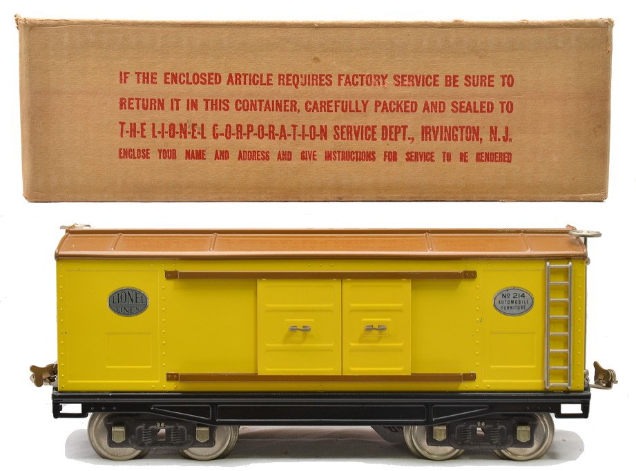Lionel 214 Yellow Boxcar w/Brown Roof OB: Lionel prewar standard gauge 214 yellow boxcar with brown roof and door guides, black lettered nickel plates, nickel trim and journals in OB, C8. The OB has all flaps attached and the paste on label i
