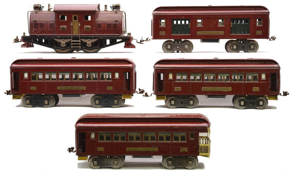 Lionel Std. Ga. Maroon Passenger Set no. 343: Lionel prewar standard gauge maroon passenger set no. 343 including; 380 electric loco with black lettered brass plates with red trim around the edges, 320 baggage with green doors and LIONEL ELECTRIC