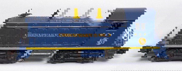 Lionel 624 Chesapeake and Ohio switcher: Lionel 624 Chesapeake and Ohio switcher, looks C6 but does have a few touch up spots. IMPORTANT: Stout Auctions has changed our grading standards to follow the new TCA standards. Please review the new