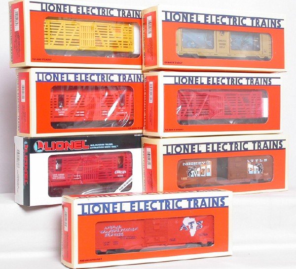 Seven Lionel animated, circus, aquarium cars: Seven Lionel animated cars: 16682 Horse Car, 16681 Animated Aquarium Car, 16686 Mickey Mouse and Bad Pete Animated Boxcar, 16662 Bugs Bunny and Yosemite Sam Outlaw Car, 16651 Animated Circus Clown Car