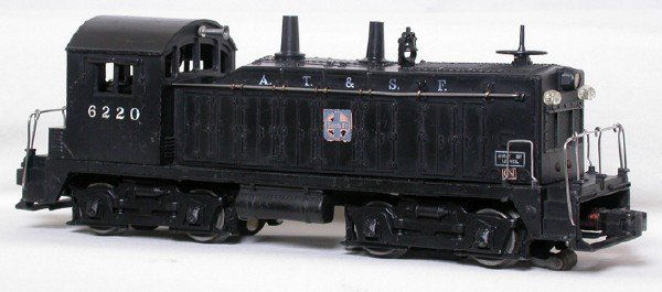 Lionel 6220 Santa Fe NW2 switcher: Lionel 6220 Santa Fe NW2 switcher, no rust, decals are 80+% intact, end railing are replacements, hood lettering is slightly faded, C6+.