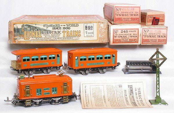 Lionel prewar 292 boxed 248 orange pass. set: Lionel prewar 292 boxed prewar set with a really nice box, orange 248 loco, 629 and 630 in orange. C6-7. Engine box is missing one end flap, car boxes have end flaps but missing a few inner flaps. Inc