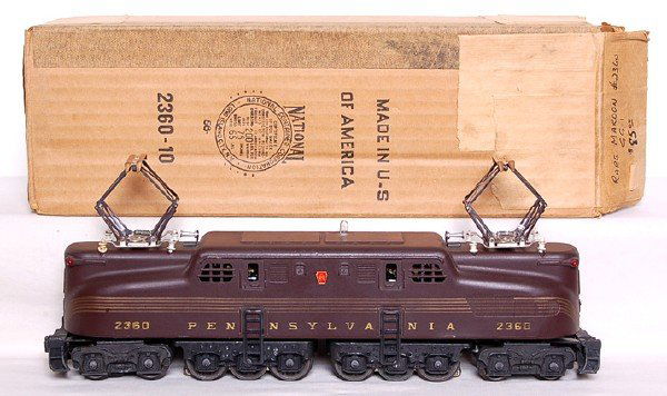 Lionel 2360 Pennsylvania GG1 Boxed: Lionel postwar 2360 Pennsylvania tuscan GG1, stripes are consistent C8. OB has insert and some writing on one end C8.