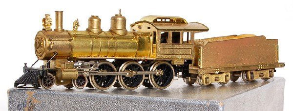 Brass Illinois Central 4-6-0 and tender, Boxed: Unpainted brass HO Illinois Central 4-6-0 and tender in original box, I do not know who made it. Has some tarnishing C7.