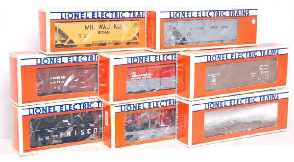 8 Miscellaneous Lionel Cars: Lionel 17300 CP Rail Reefer, 9469 New York Central Boxcar, 19302 Milwaukee Road Hopper with Coal Load, 19304 Great Northern Covered Hopper, 16907 Flatcar with Farm Tractors, 19408 Frisco Coil Gondola,