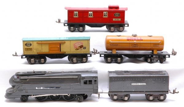 Lionel 1668 1689W 1679 1680 1682: Lionel prewar gunmetal 1668 steam, 1689W tender, 1679 Baby Ruth boxcar, 1680 tank, 1682 caboose. Set is C6, tender is C5.