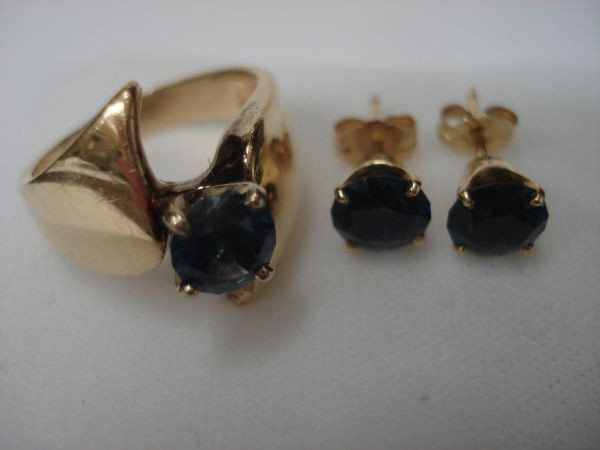 Lady's Solitaire Blue Sapphire Ring and Matching S: Lady's Solitaire Blue Sapphire Ring and Matching Solitaire Blue Sapphire Earrings: 14K YG, signed HH, AAA color quality, each sapphire is approx. 1 ct. (3 cttw), round marigold cut, ring size 6-1/4, 4