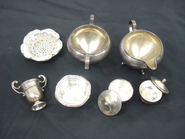 7 Sterling Pieces: Sugar/Creamer and Others: 7 Sterling Pieces: sugar/creamer, toothpick holder with hallmarks, 2 covered salt cellars, tea strainers (missing holder), nut cup, 8.1 Toz