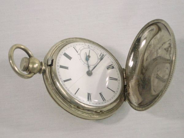 Gent’s White Metal Pocket Watch: Gent’s White Metal Pocket Watch, key wind (no key), engraved hunter case (no monogram), hairline on porcelain dial, case marked Thiery