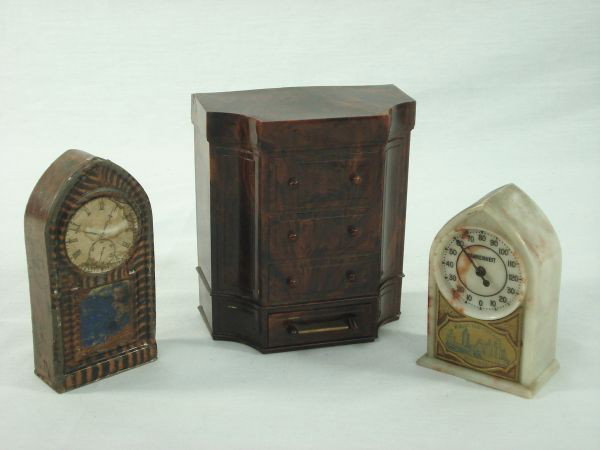 2 Banks and 1 Thermometer: 2 Banks and 1 Thermometer: Cabinet Bakelite Mechanical Bank by Park Sherman H.5"; Tin Bank Depicting Clock, paint loss; World's Fair Chicago 1933-1934 Bakelite Thermometer