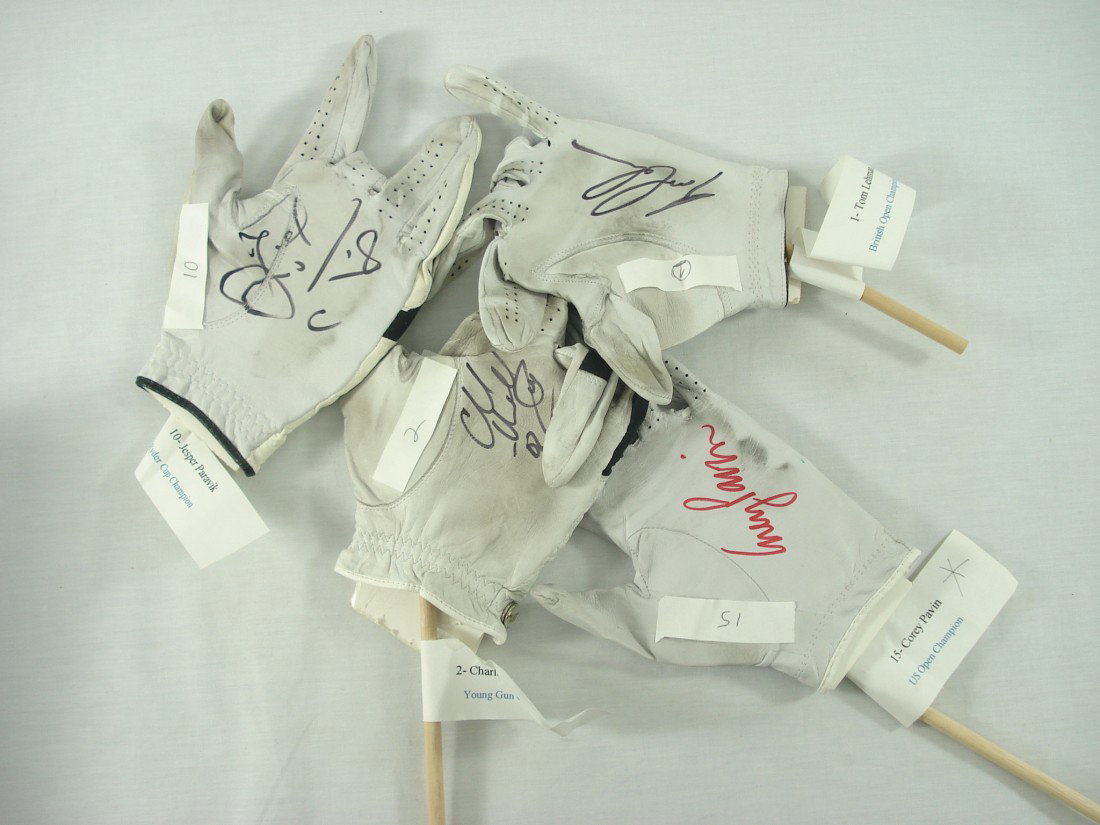 Autographed Golf Gloves: 4 Autographed Golf Gloves: Corey Pavin, US Open Champion; Tom Lehman, British Open Champion; Charles Howell III, Young Gun Champion; Jesper Paravik, 3-time Ryder Cup Champion