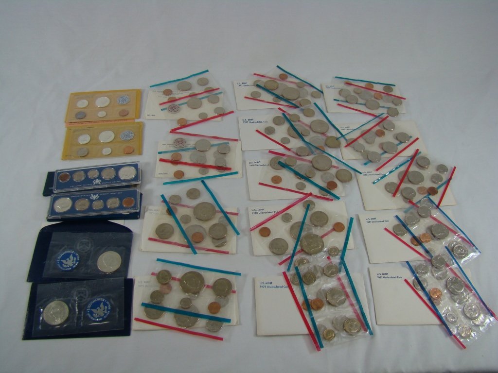 Proof Sets and Eisenhower Silver Dollars: 18 Proof Sets and 2 Eisenhower Silver Dollars: Proof Sets dated 1962, 1963, 1975, 1972, 1972, 1980, 1981, 1980, 1978, 1978, 1977, 1977, 1975, 1979, 1979, 1981, 1966, 1967; Silver Dollars are both date