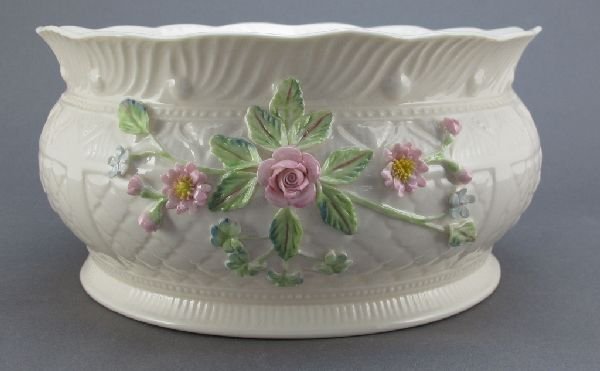 Belleek "McBirney" Centerpiece Bowl Limited Ed.: Belleek Fine Parian China "McBirney" Limited Edition Centerpiece Bowl with applied flowers on the front, marked "1999 Annual Piece Limited Edition", Dia.9", H.4-3/8", comes with original box, in good 