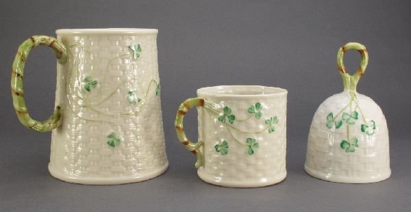 3 Pieces Belleek China "Shamrock" Mugs, Bell: 3 Pieces Belleek Fine Parian China: Large "Shamrock" Mug with green stem handle, seventh gold mark (1981-92), H.4-1/2"; Small "Shamrock" Mug with green stem handle, Seventh Gold mark, H.2-3/4"; "Shamr