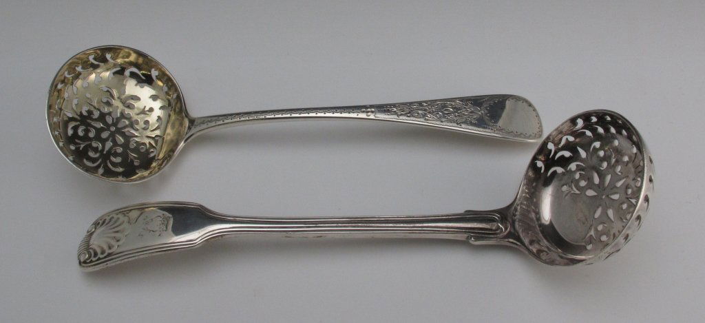 2-1800s Victorian Sifter Ladles: 2 Sterling Silver Sifter Labels, Victorian: sifter ladle with shell design on handle and bowl, old hallmarks indicate 1882, length 6-5/8", 2.19 Toz; silver ladle with fine etched pattern on handle, ol