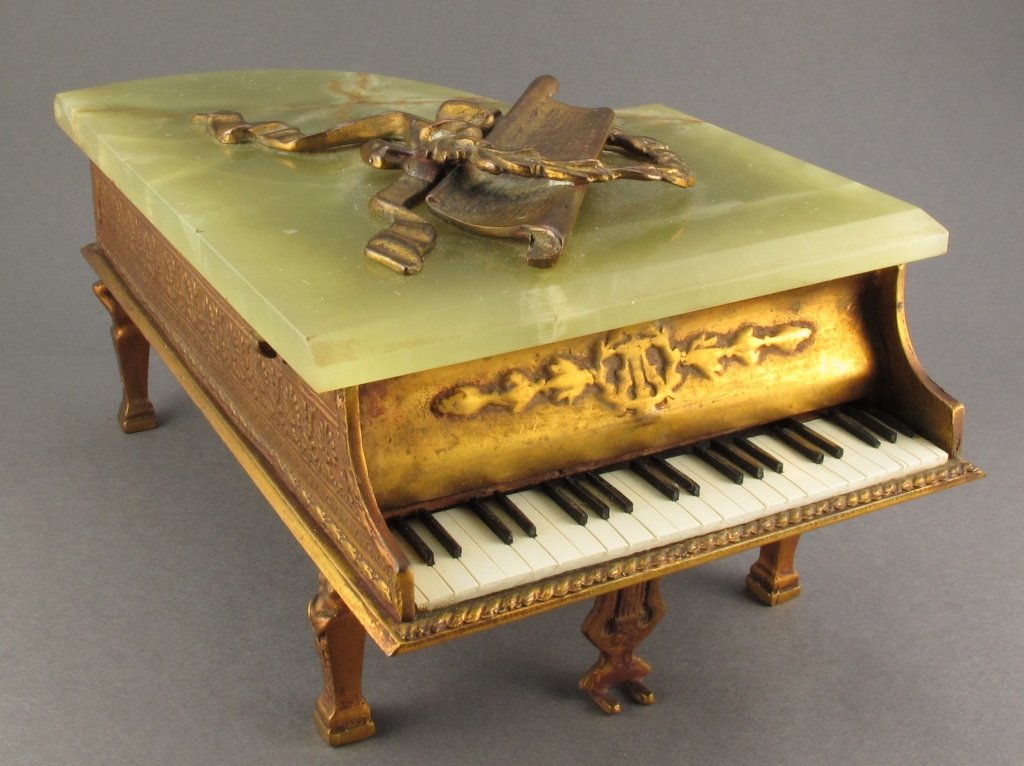 Metal and Bakelite Piano Music/Jewelry Box: Piano Music Box, green bakelite with ormolu fittings, plays, can be used to store jewelry under top, H. 4"