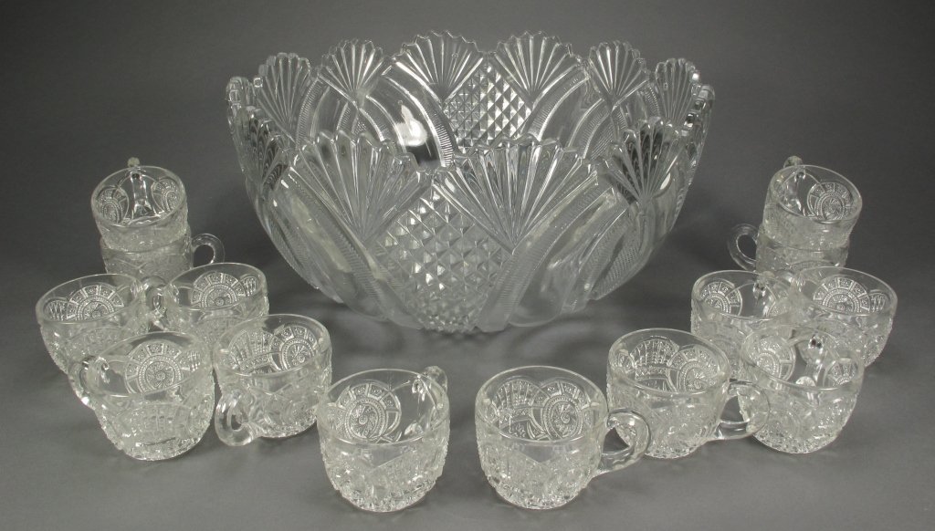 Large Pressed Glass Punch Bowl with 14 Glass Cups: Large Pressed Glass Punch Bowl with 14 Glasses, Punch Bowl measures 15" in Diameter and 7-7/8" in Height, Cups are cut glass with a glass handle and measure 2-1/4" in height.