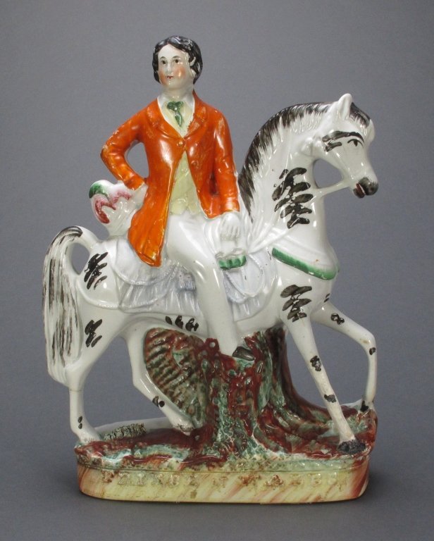 19th C Staffordshire Man on Horse: 19th C Staffordshire Figural Group, man on white horse with black stripes, base says "Prince of Wales", H. 12-5/8", possible old repair on legs