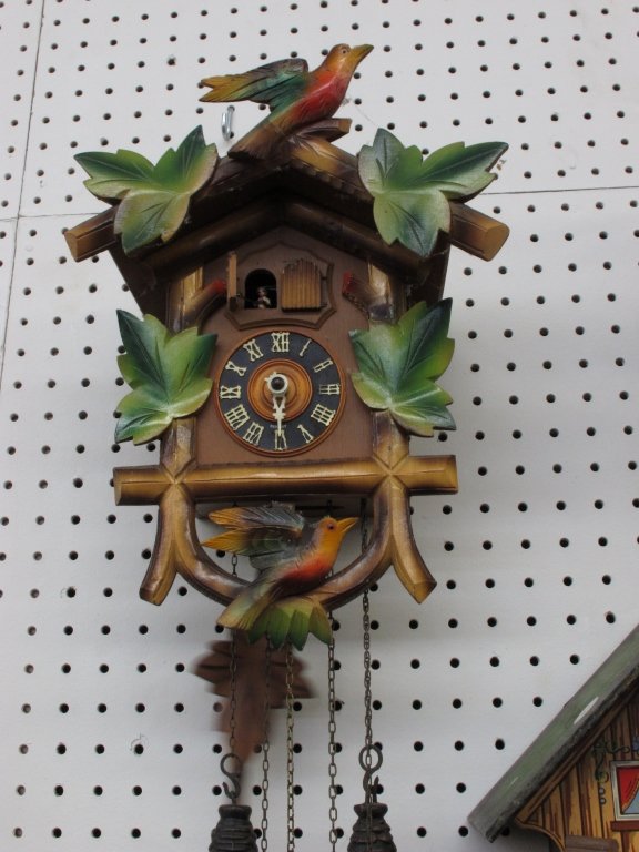 German 3-Weight Cuckoo Wall Clock: German 3-Weight Cuckoo Wall Clock, colorful bird and leaf motif, running, chiming, music plays, hour hand broken, H. 13-1/2"