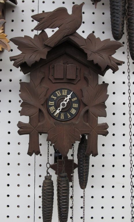 German 3-Weight Cuckoo Wall Clock: German 3-Weight Cuckoo Wall Clock, leaf and bird motif, running, chiming, music does not play, H. 11-1/4"