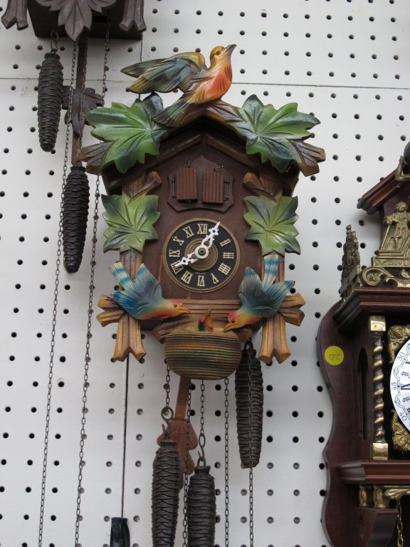 German 3-Weight Cuckoo Wall Clock: German 3-Weight Cuckoo Wall Clock, colorful bird and leaf motif, lower 2 birds move when chiming, running, chiming, music box does not play, H. 12"