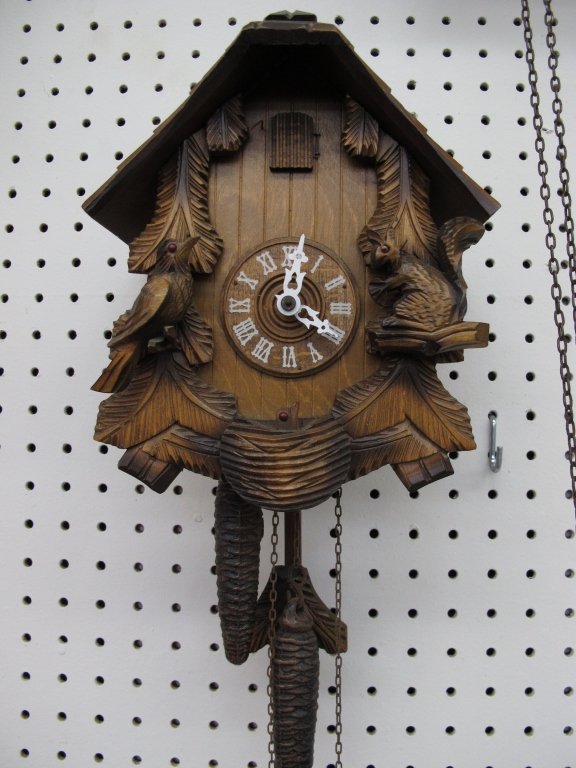 German 2-Weight Cuckoo Wall Clock: German 2-Weight Cuckoo Wall Clock, chalet, bird and squirrel motif, running, chiming, H. 9-1/2"