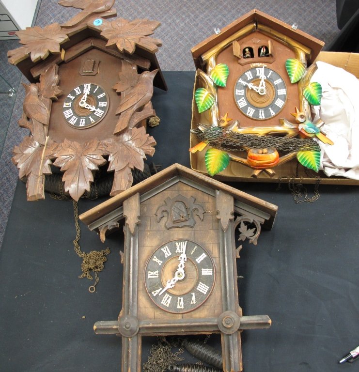 3 German Cuckoo Clocks Needing Repair: 3 German Cuckoo Clocks Needing Repair: German 2-Weight Cuckoo Clock, needs cosmetic repair, not running, H. 16-1/2"; German 3-Weight 8-Day Cuckoo Clock with Colorful Bird Motif, not running, H. 12-1/2
