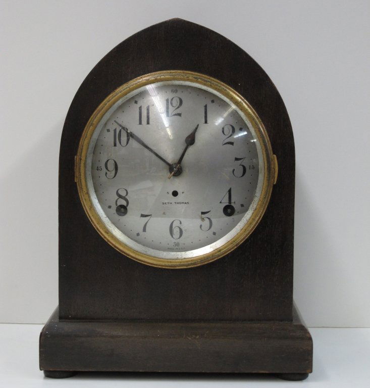 Beehive Clock by Seth Thomas: Beehive Clock by Seth Thomas, running, chiming, H. 10-1/4", W. 8", D. 5", Dial 5-5/8", back panel is warped and will not close