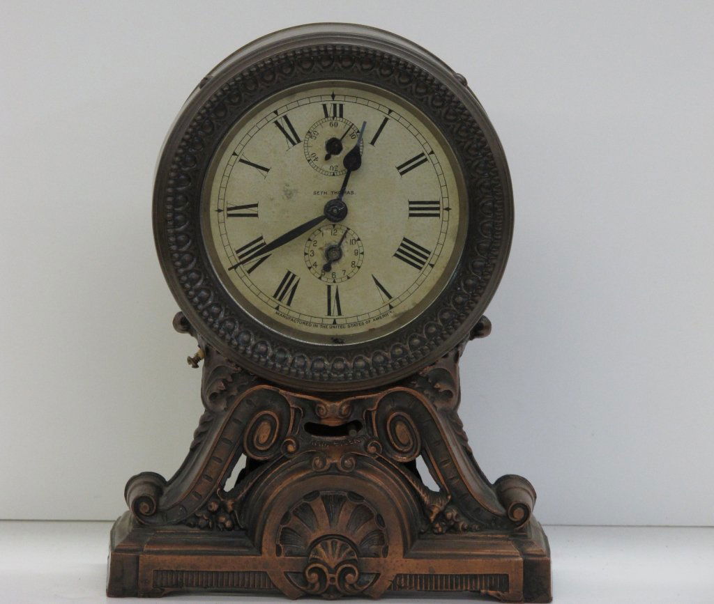 Wind-up Brass Alarm Clock by Seth Thomas: Wind-up Brass Alarm Clock by Seth Thomas, running, chiming, H. 9-1/8", W. 7", D. 3-5/8", Dial 4"