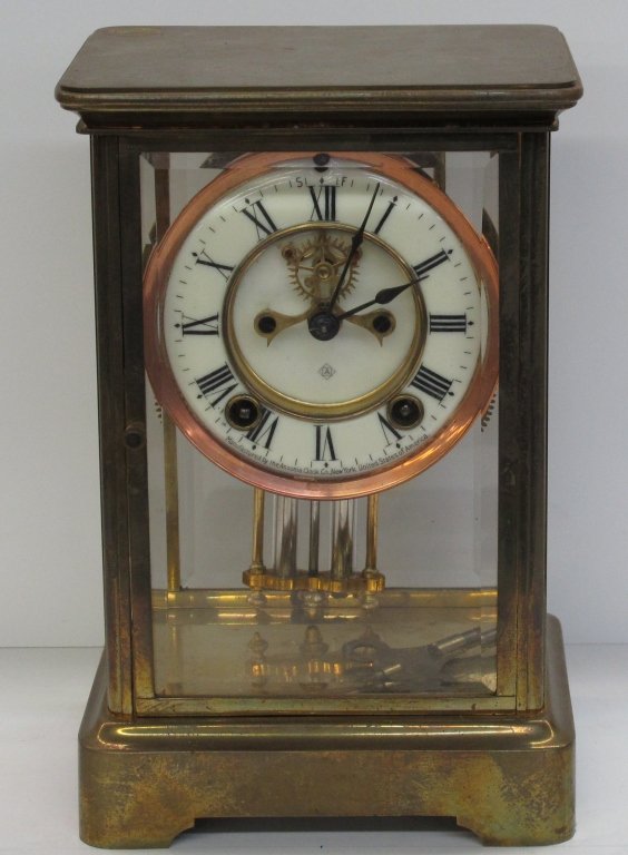 Ansonia Brass and Glass Clock Crystal Regulator: Ansonia Brass and Glass Clock Crystal Regulator, running, chiming, open escapement, faux mercury pendant, H. 9-5/8", W. 6-1/4", D. 5-1/4", Dial 4-7/8", left panel of glass chipped
