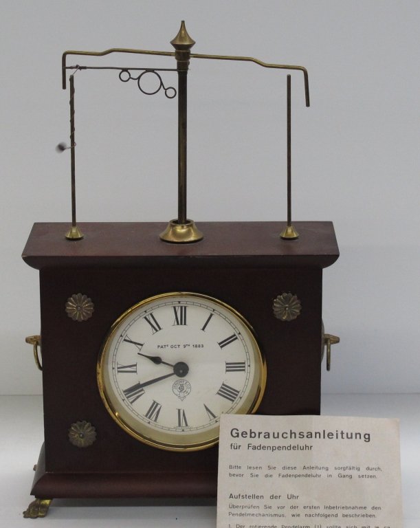 German String Pendulum Clock: German String Pendulum Clock, in tact, running, needs adjustment, dial is marked "Jerome & Company", "West Germany", back of movement marked "HOROLOVAR", "The Horolovar Co., Bronxville, New York, Made