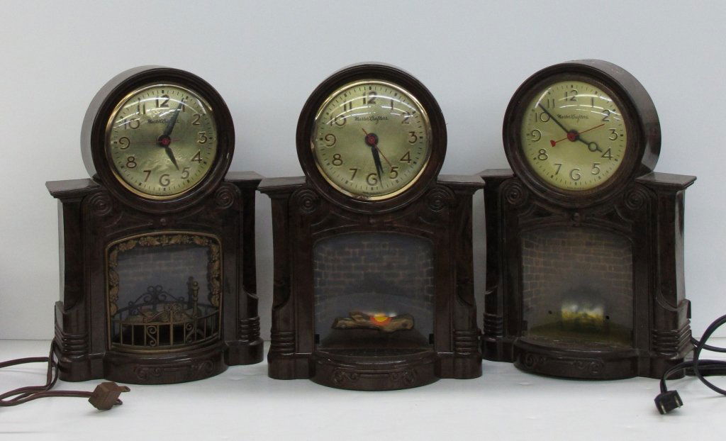 3 MasterCrafters Light-up Fireplace Clocks Working: 3 Master Crafters Light-up Fireplace Clocks Working, Model 272, missing pieces, H. 10-1/2", W. 7-1/4", D. 5", Dial 4", see pictures for more detail