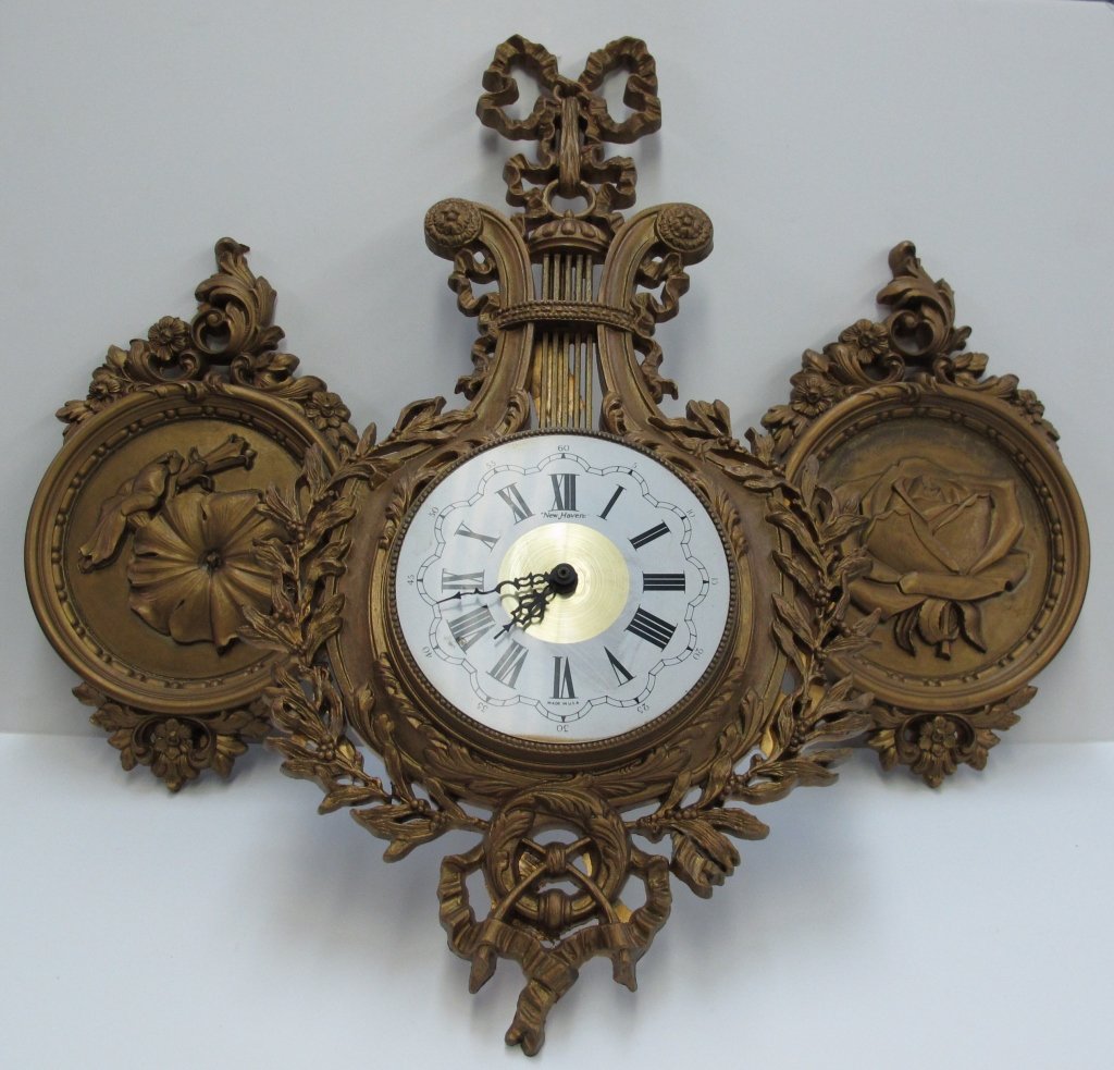 Wall Clock with Matching Sconces by New Haven: Wall Clock with Matching Sconces by New Haven, running, battery-operated, clock is H. 24-1/2", Dial 6-1/4", sconces are H. 13-1/2"